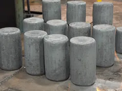 Custom steel rounds prepped for open-die forgings at Great Lakes Forge